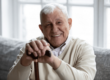 man smiles while enjoying the benefits of short-term care for seniors