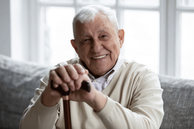 3-Benefits-of-Short-Term-Care-for-Seniors man smiles while enjoying the benefits of short-term care for seniors